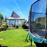 Holiday home Wohlfuehloase In Der Eifel Mit Weitblick In Natur, Seenaehe, Poolnutzung, Minigolf, Tennis Und Vieles Mehr